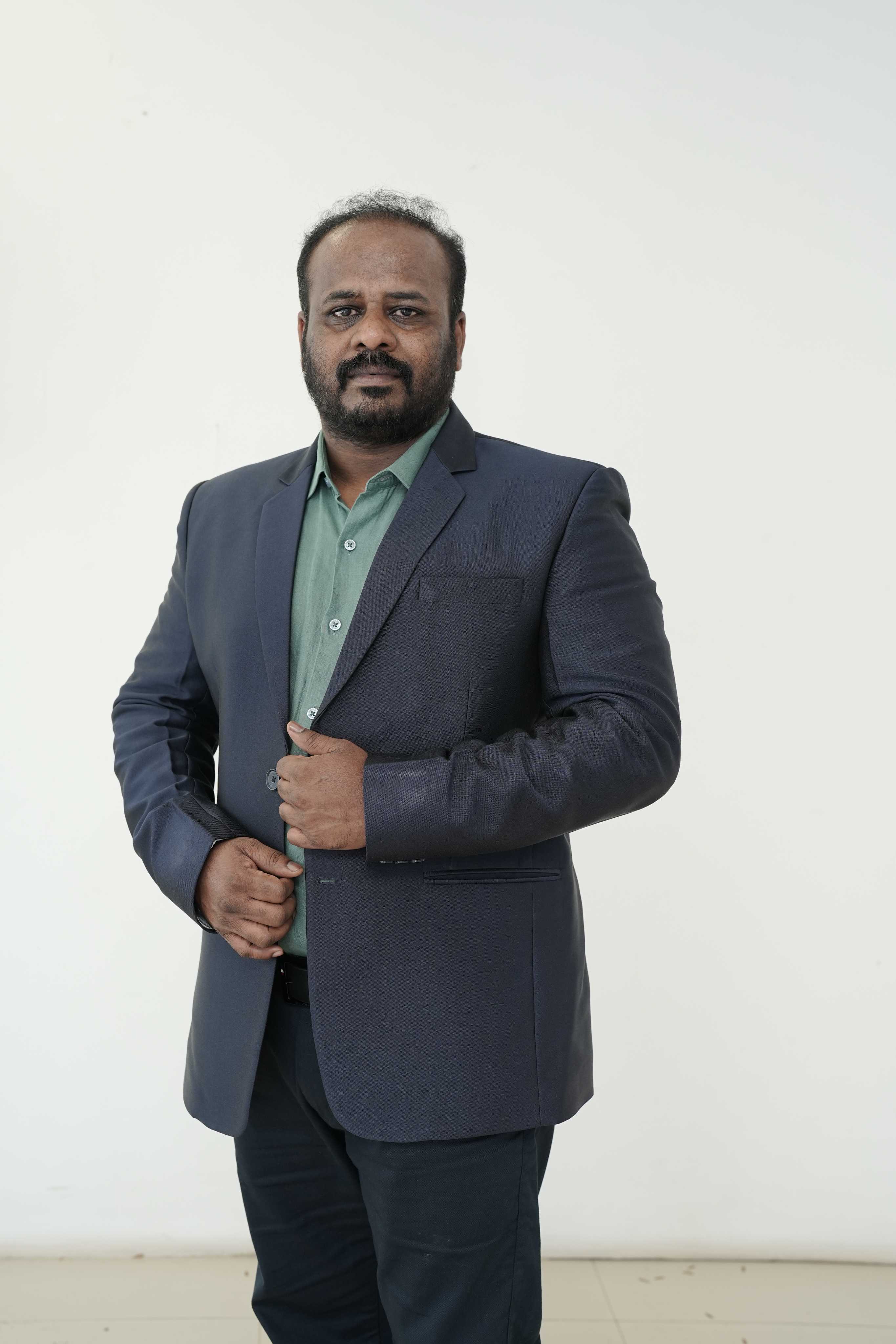 Dr. Harish Krishnan